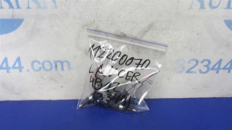 Форсунка топливная MITSUBISHI LANCER X 10 07-15 Седан 2.4 Форсунка топливная MITSUBISHI LANCER X 10 07-15 Седан 2.4