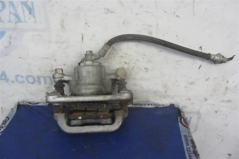 Суппорт тормозной задний левый NISSAN ALTIMA L33 12-18 L33 Суппорт тормозной задний левый NISSAN ALTIMA L33 12-18 L33