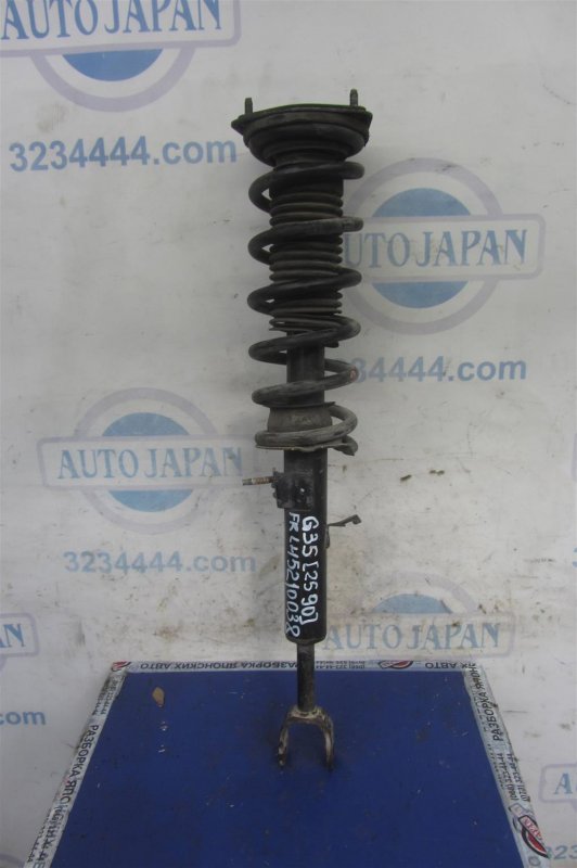 Амортизатор передний левый INFINITI G35 03-07 56110-AM626 Б/У