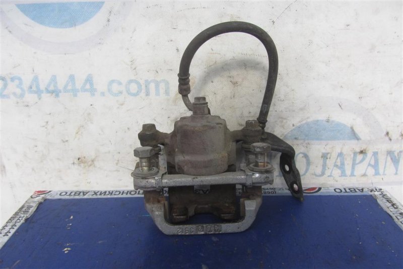 Суппорт тормозной задний правый INFINITI G35 03-07