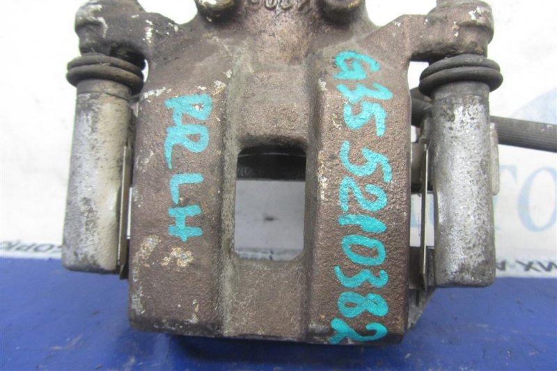 Суппорт тормозной задний левый G25/G35/G37/Q40 06-14