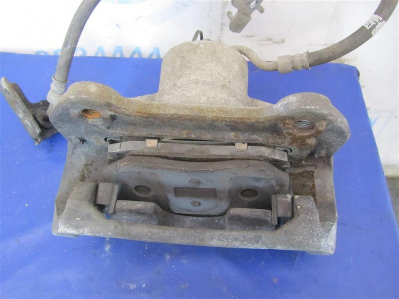 Суппорт тормозной передний правый TUCSON TL 15-20