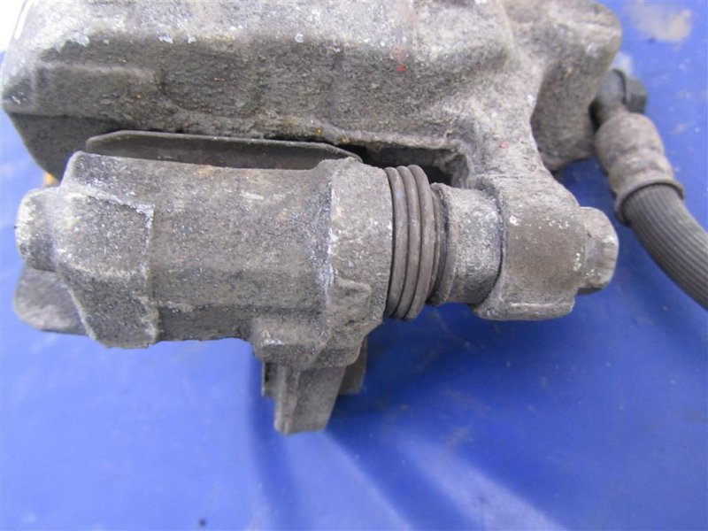 Суппорт тормозной задний левый TUCSON TL 15-20 Суппорт тормозной задний левый TUCSON TL 15-20