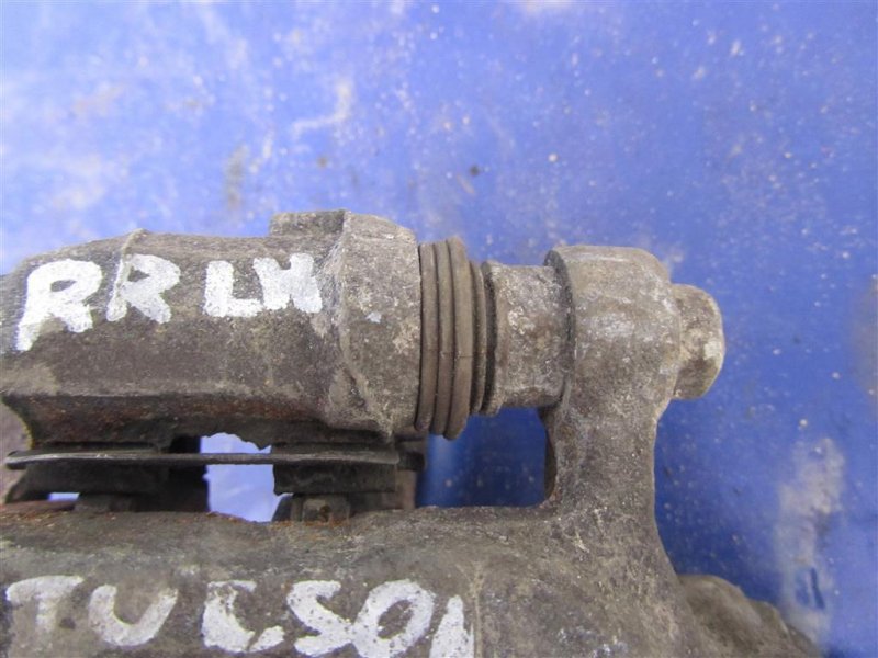 Суппорт тормозной задний левый TUCSON TL 15-20 Суппорт тормозной задний левый TUCSON TL 15-20