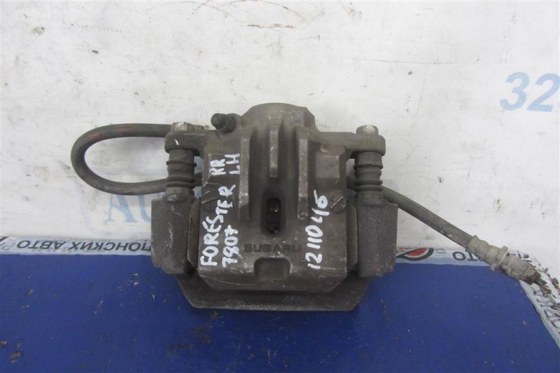 Суппорт тормозной задний левый SUBARU FORESTER 12-19 2015 Внедорожник 2.5 26692SG010 Б/У