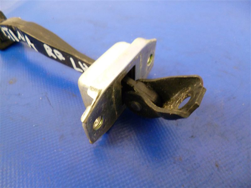 Ограничитель двери задний левый NISSAN ALTIMA L33 12-18 L33