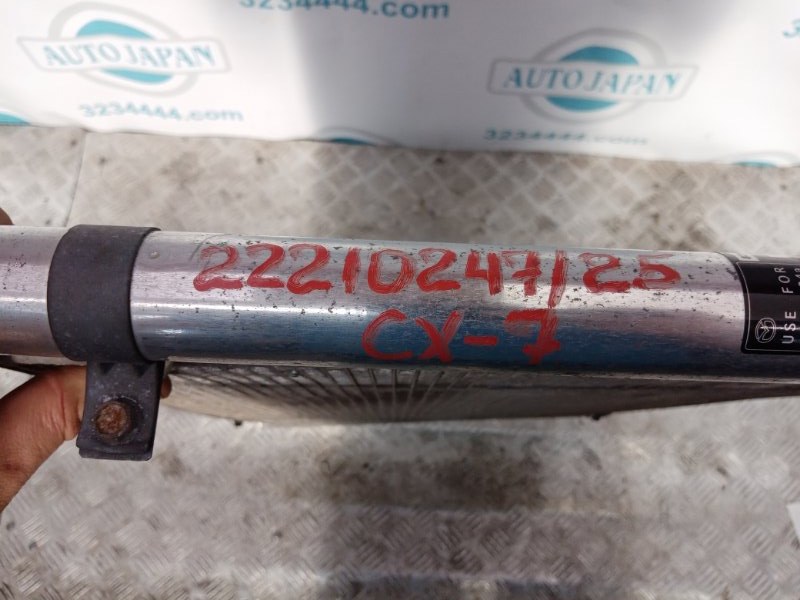 Радиатор кондиционера CX-7 06-12