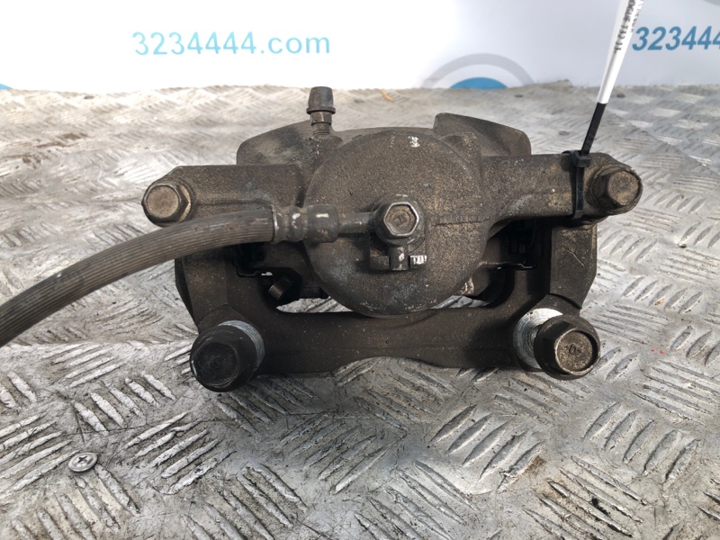 Суппорт тормозной передний левый NISSAN X-TRAIL/ROGUE T32 13-20