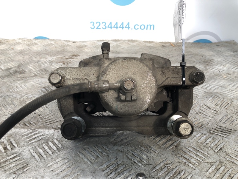 Суппорт тормозной передний левый NISSAN X-TRAIL/ROGUE T32 13-20