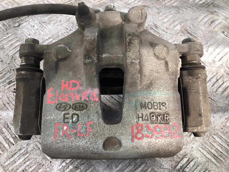 Суппорт тормозной передний левый ELANTRA HD 06-11