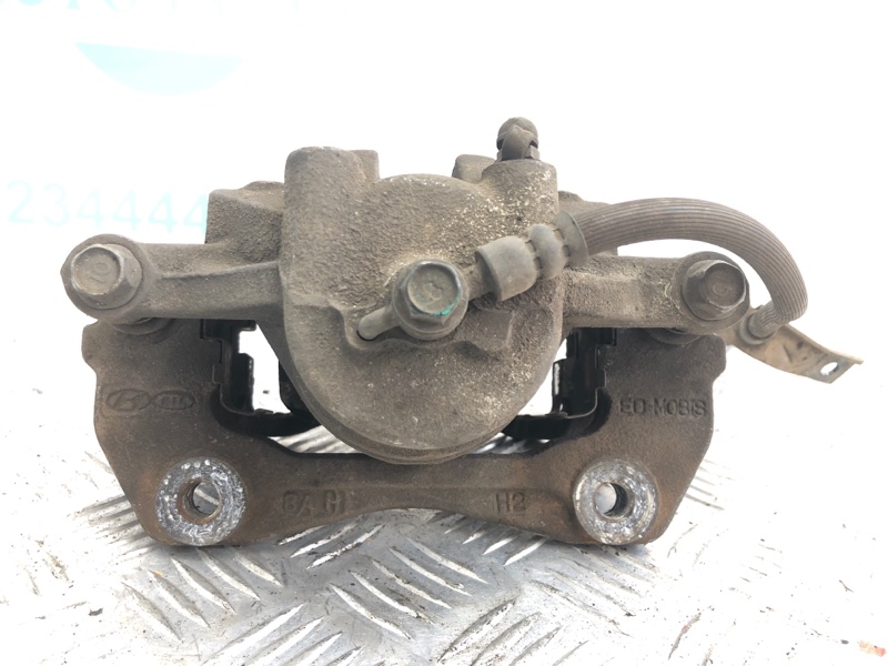 Суппорт тормозной передний левый HYUNDAI ELANTRA HD 06-11