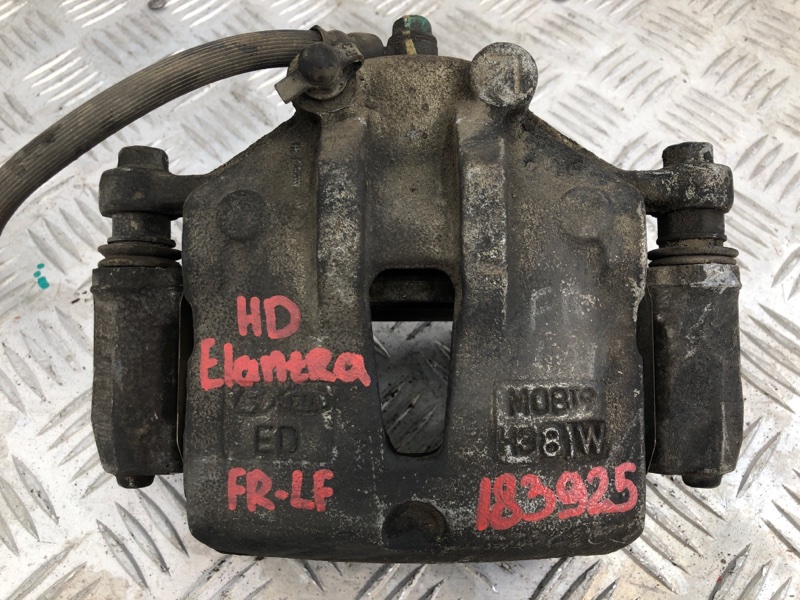 Суппорт тормозной передний левый ELANTRA HD 06-11