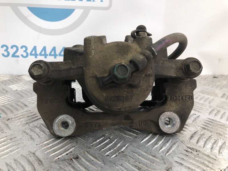 Суппорт тормозной передний левый HYUNDAI ELANTRA HD 06-11