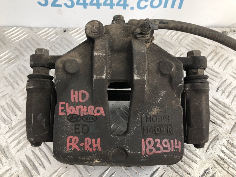 Суппорт тормозной передний правый ELANTRA HD 06-11