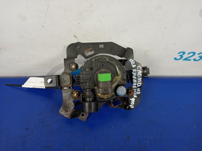 Противотуманная фара левая MITSUBISHI L200 06-14