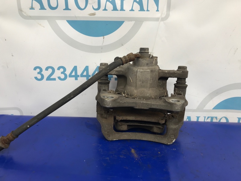 Суппорт тормозной задний правый SIENNA 11-16