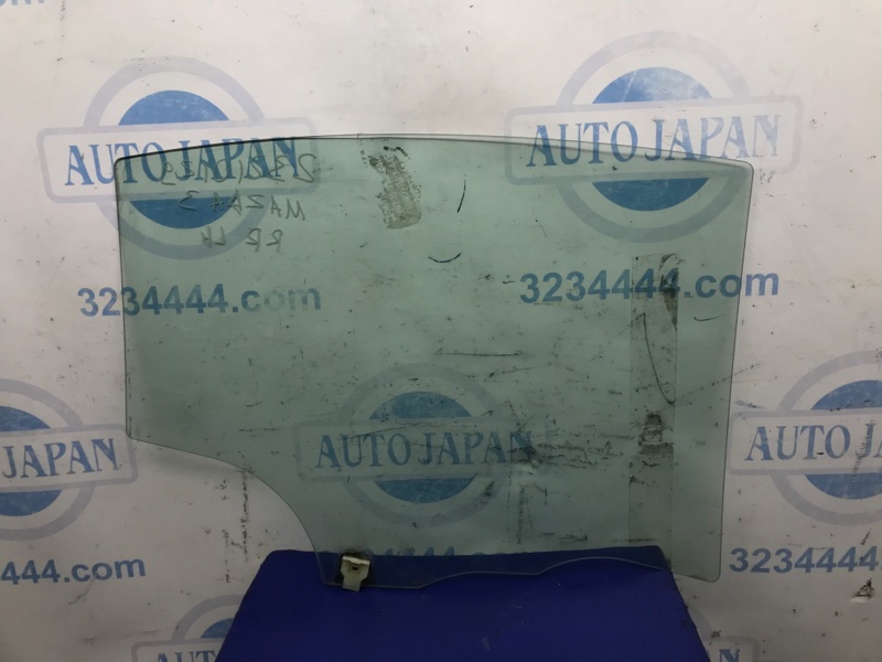 Стекло двери заднее левое MAZDA 3 BK 03-08