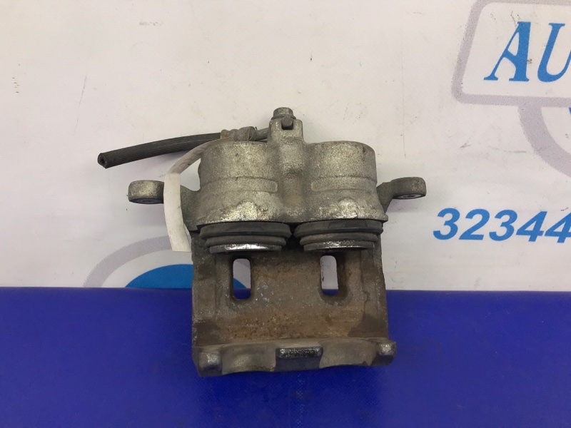 Суппорт тормозной передний левый G35 03-07