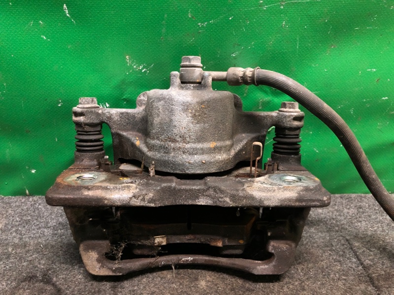 Суппорт тормозной передний левый CIVIC ES 00-05