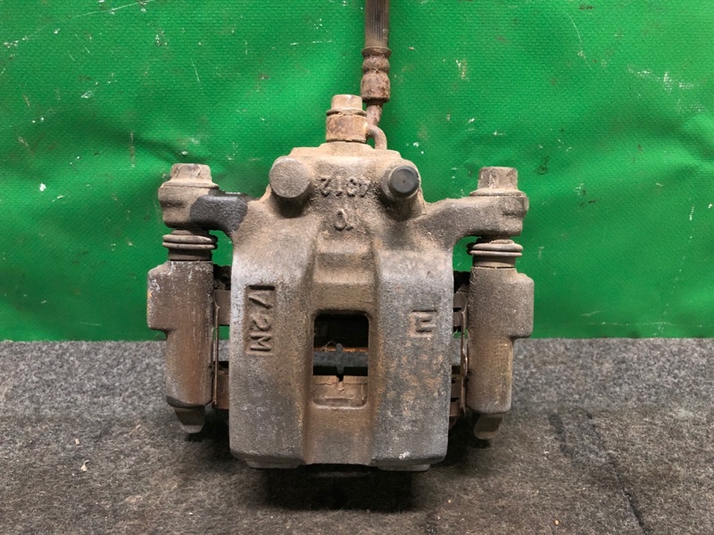 Суппорт тормозной задний левый INFINITI G25/G35/G37/Q40 06-14 2008 Седан 3.5 VQ35HR 44011-EG50C Б/У