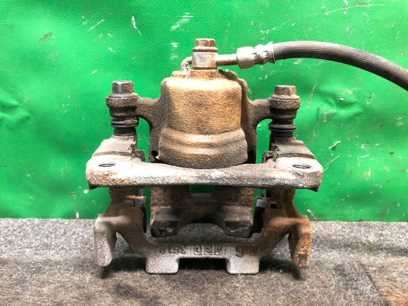 Суппорт тормозной задний левый Q50 15-20 Седан