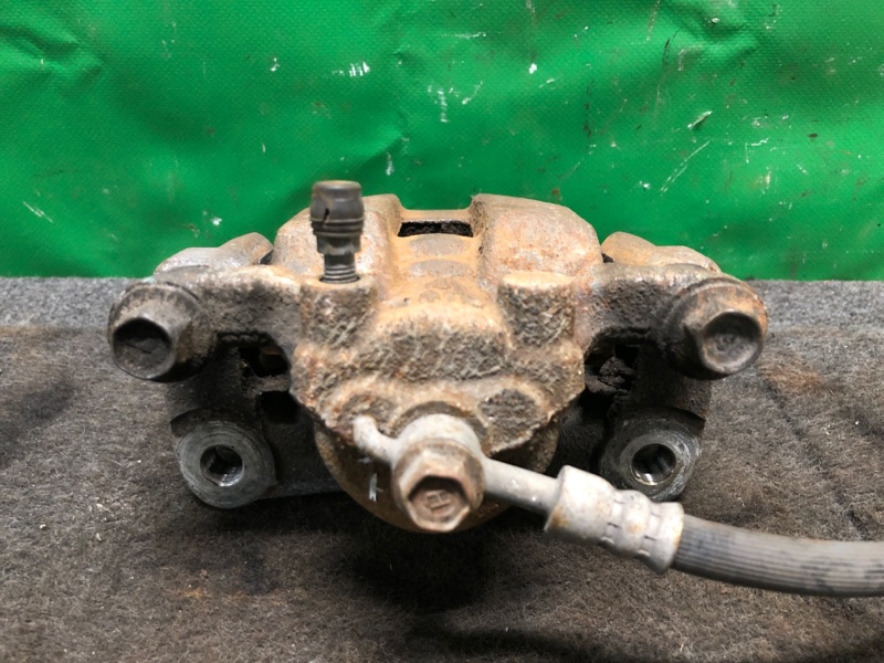 Суппорт тормозной задний левый INFINITI Q50 15-20 Седан