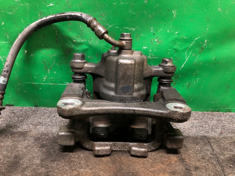 Суппорт тормозной задний левый G25/G35/G37/Q40 06-14 2007 Седан 3.5 VQ35HR