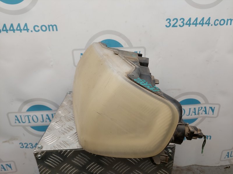 Фара передняя левая PAJERO 99-06