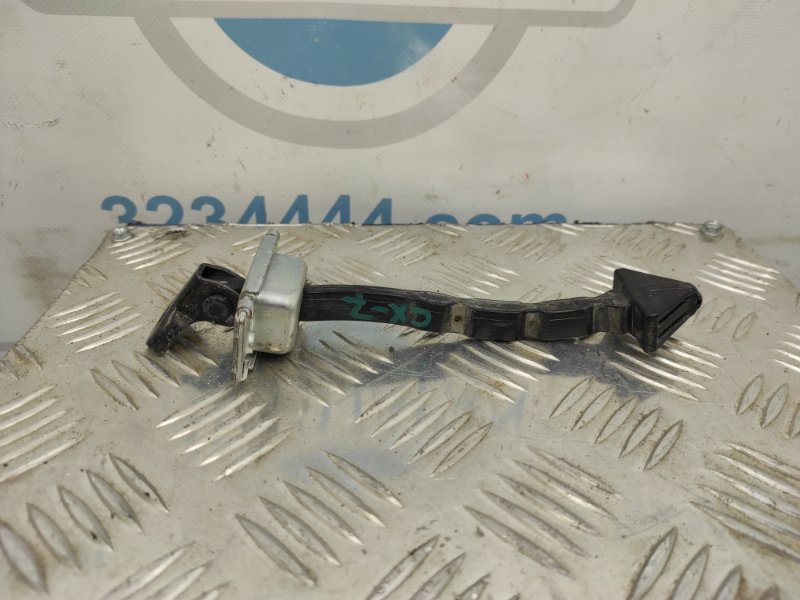 Ограничитель двери передний левый CX-7 06-12 2010 Внедорожник 2.5 Ограничитель двери передний левый CX-7 06-12 2010 Внедорожник 2.5