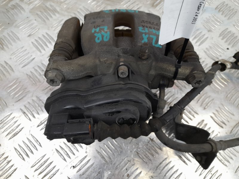 Суппорт тормозной задний левый TLX 14-17 2015 Седан 2.4