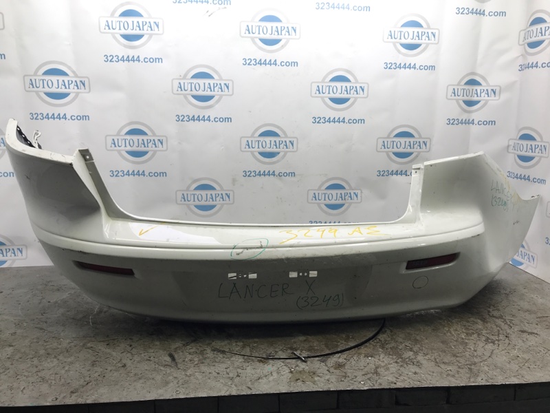 Запчасть бампер задний MITSUBISHI LANCER X 10 07-15 2011 Седан 2.0 6410B172WA Б/У Бампер задний MITSUBISHI LANCER X 10 07-15 2011 Седан 2.0 6410B172WA Б/У