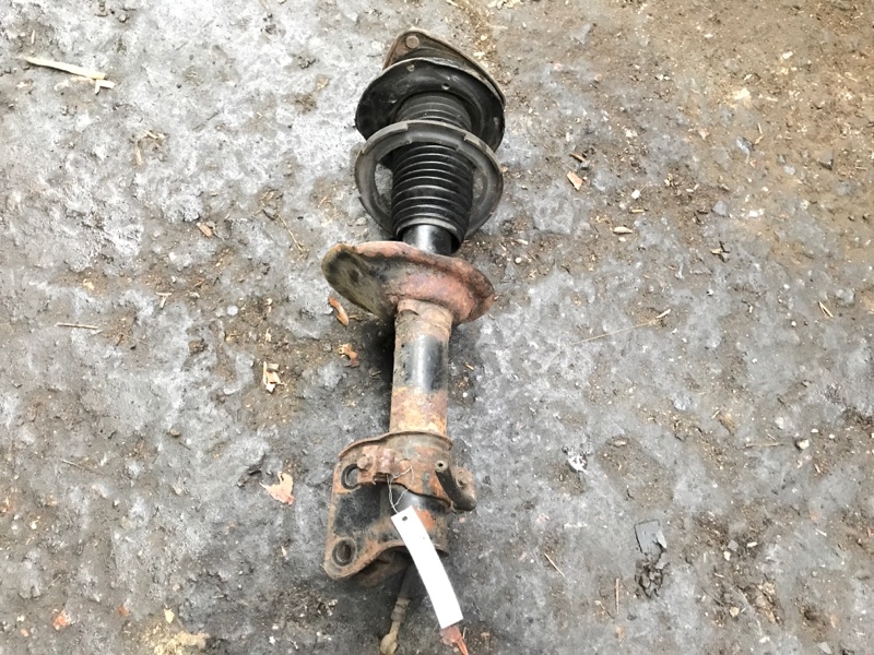 Амортизатор передний левый IMPREZA 00-07 GD/GG