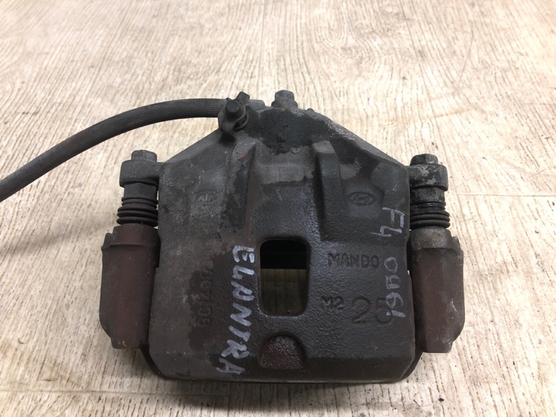 Суппорт тормозной передний левый HYUNDAI ELANTRA HD 06-11 2007 HD 2.0 G4GC 58110-2H300 Б/У