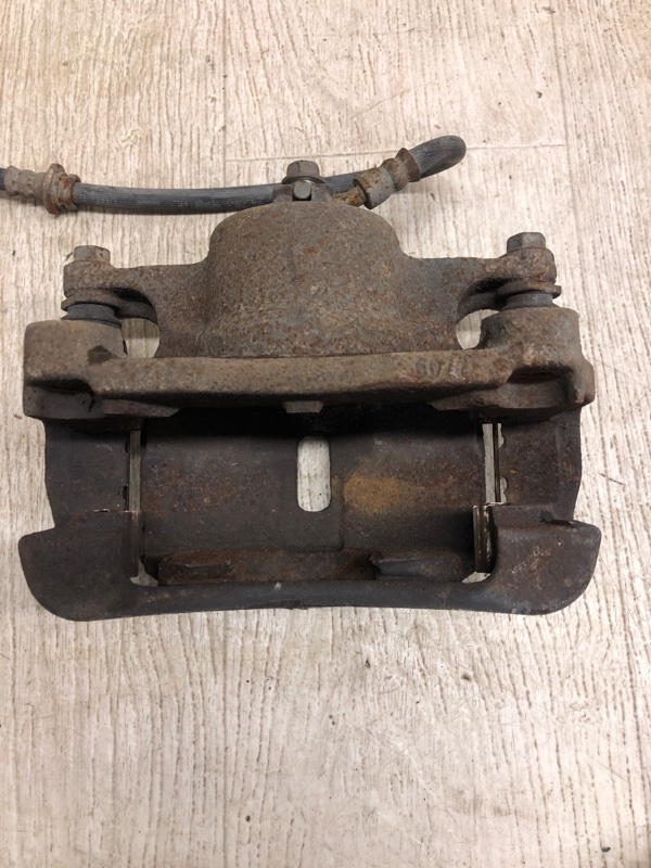 Суппорт тормозной передний левый X-TRAIL/ROGUE T32 13-20 2017 T32 2.5 QR25DE