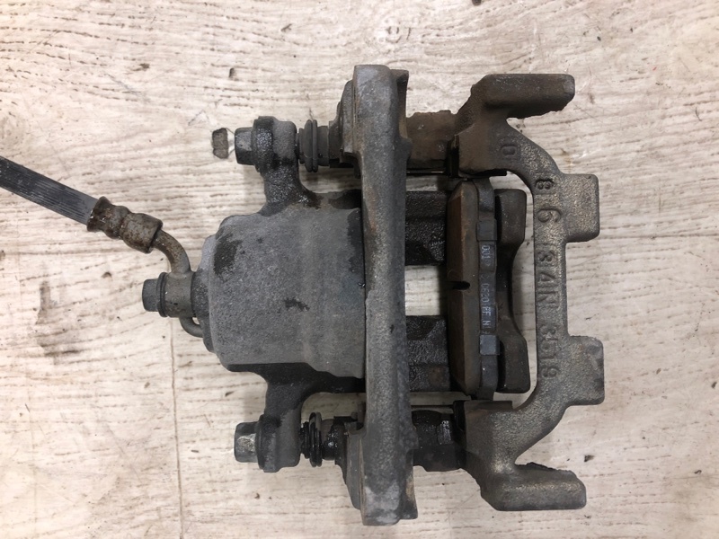 Суппорт тормозной задний левый NISSAN PATHFINDER R52 12-21 R52 3.5 VQ35DE