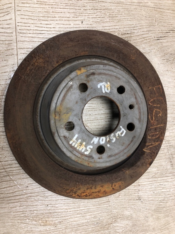 Запчасть тормозной диск задний FORD FUSION 14- 2014 CD4 C25HDEX DG9Z-2C026-A Б/У Тормозной диск задний FORD FUSION 14- 2014 CD4 C25HDEX DG9Z-2C026-A Б/У