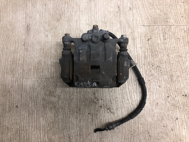 Суппорт тормозной передний левый FORD FIESTA 08-17 2013 CCN 1.6 HXJB BE8Z-2B121-AA Б/У