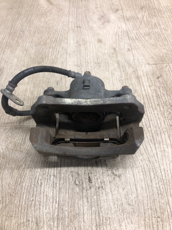 Суппорт тормозной передний левый FIESTA 08-17 2013 CCN 1.6 HXJB