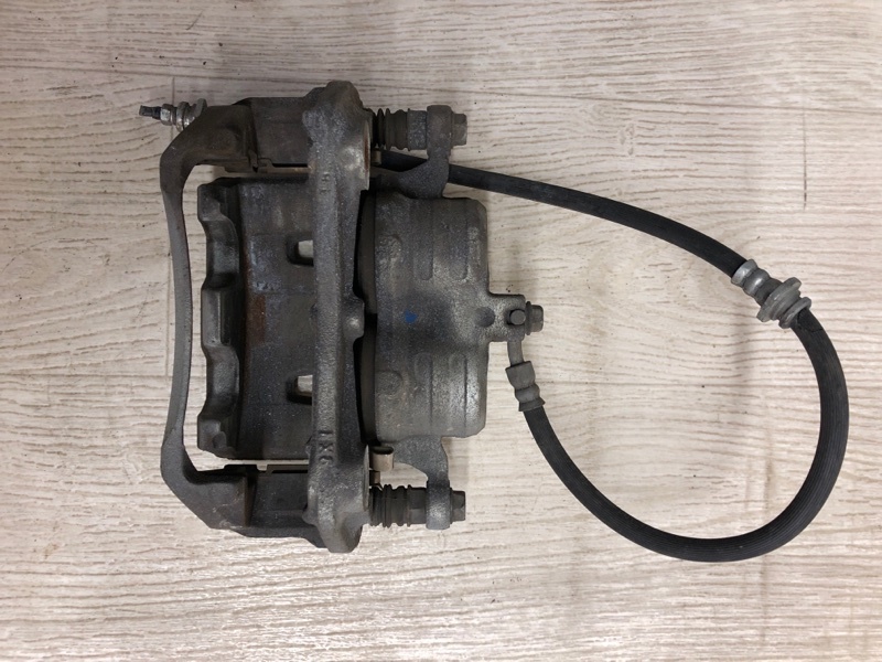 Суппорт тормозной передний правый NV200 USA 13- 2020 M20XUS 2.0 MR20DE