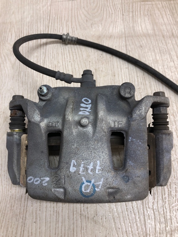 Суппорт тормозной передний правый NV200 USA 13- 2020 M20XUS 2.0 MR20DE