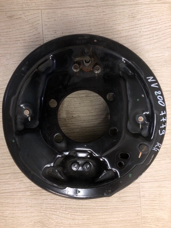 Тормозной механизм задний левый NV200 USA 13- 2020 M20XUS 2.0 MR20DE