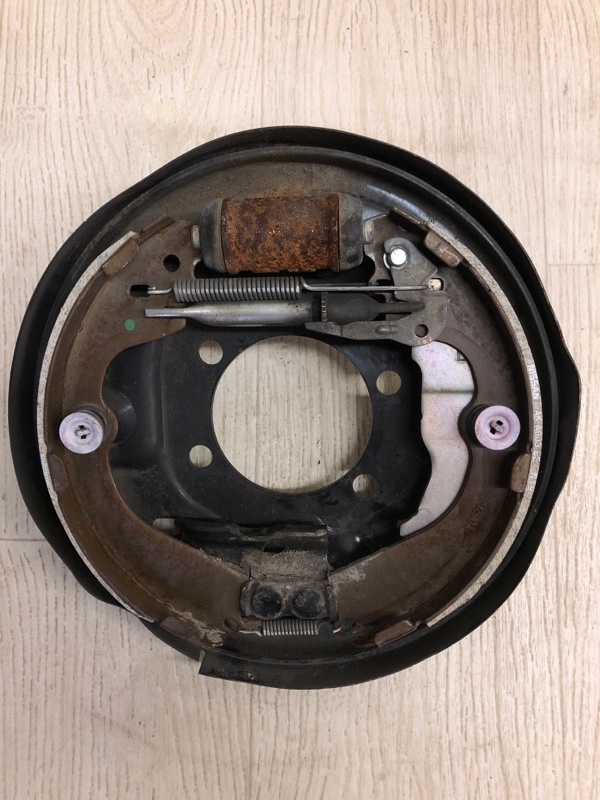 Тормозной механизм задний левый NISSAN NV200 USA 13- 2020 M20XUS 2.0 MR20DE 44010-3LM0A Б/У