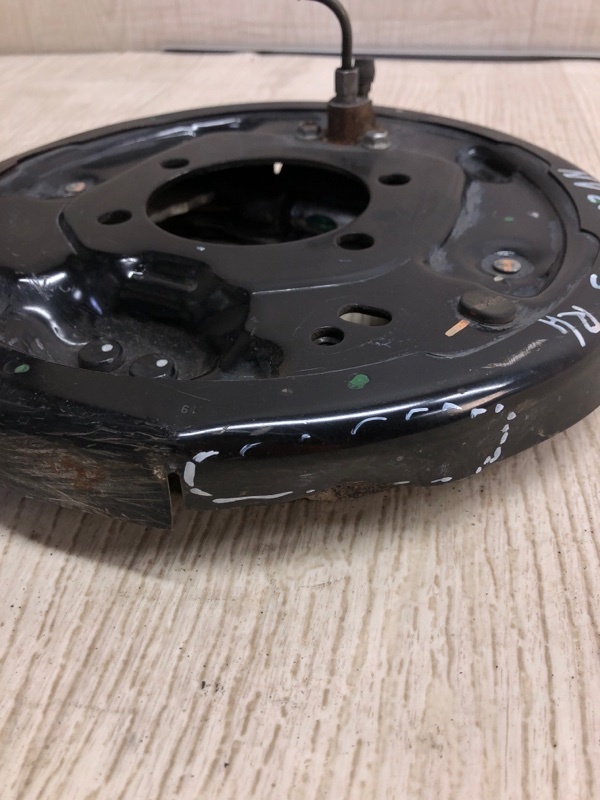 Тормозной механизм задний левый NV200 USA 13- 2020 M20XUS 2.0 MR20DE