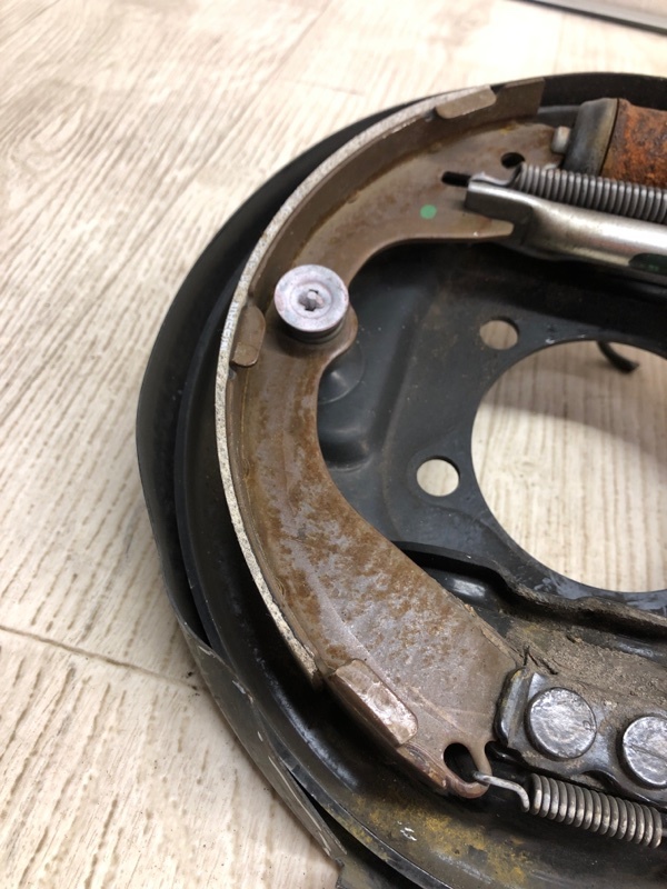 Тормозной механизм задний левый NV200 USA 13- 2020 M20XUS 2.0 MR20DE