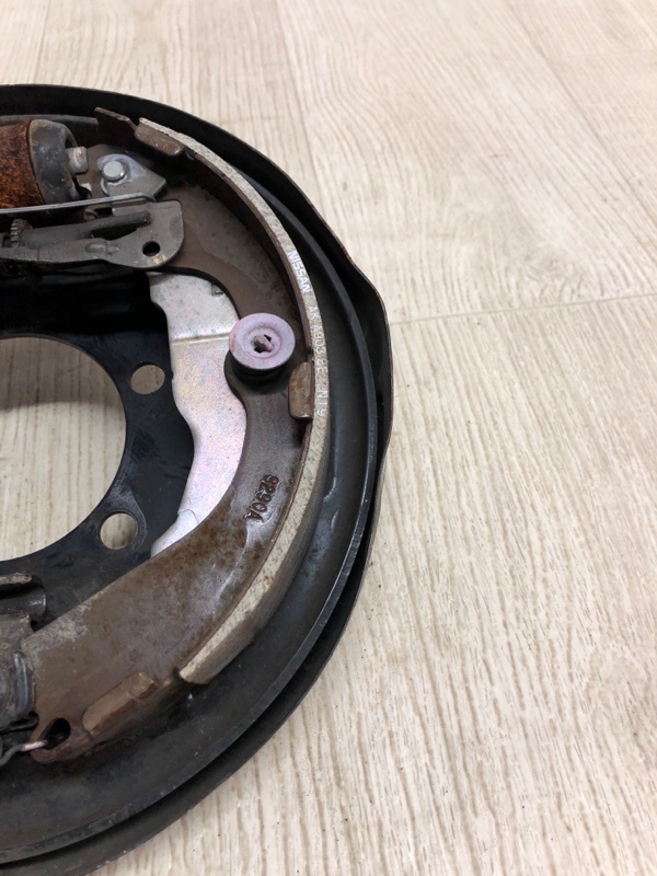 Тормозной механизм задний левый NV200 USA 13- 2020 M20XUS 2.0 MR20DE