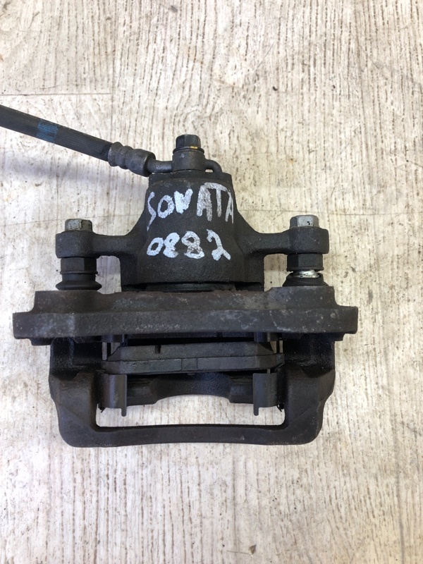 Суппорт тормозной задний левый SONATA LF 2014- 2015 LF 2.4 G4KJ