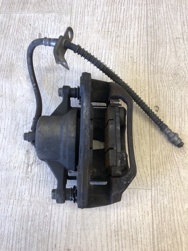 Суппорт тормозной передний левый KIA FORTE/CERATO TD 08-13 TD 2.0 G4KD