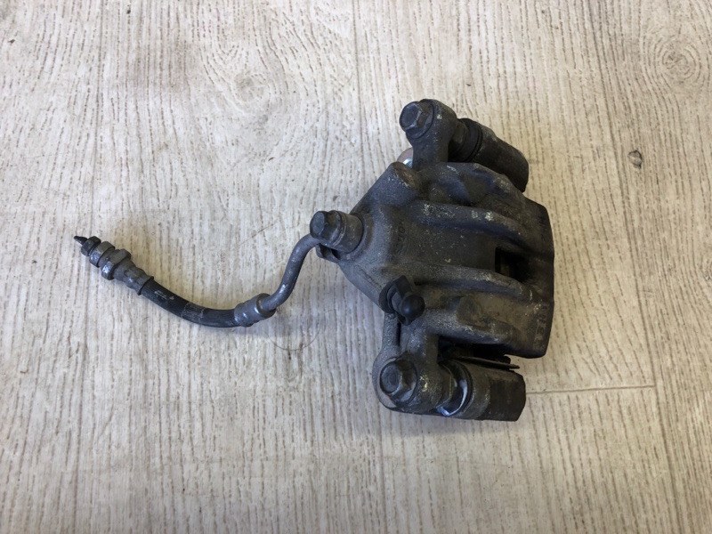 Суппорт тормозной задний левый FORTE/CERATO TD 08-13 2011 TD 2.0 G4KD Суппорт тормозной задний левый FORTE/CERATO TD 08-13 2011 TD 2.0 G4KD