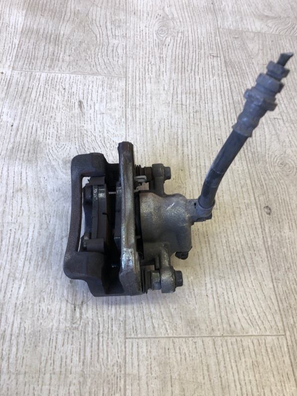 Суппорт тормозной задний левый KIA FORTE/CERATO TD 08-13 TD 2.0 G4KD Суппорт тормозной задний левый KIA FORTE/CERATO TD 08-13 TD 2.0 G4KD