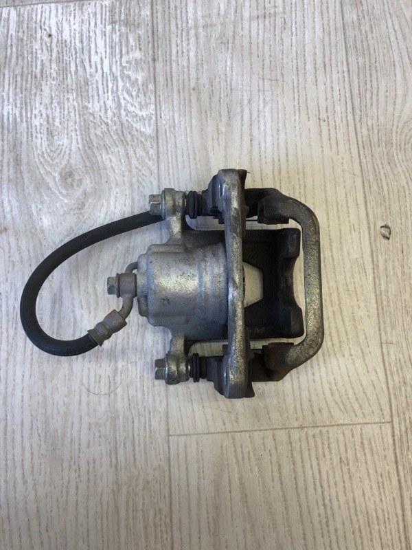 Суппорт тормозной задний левый NISSAN ALTIMA L33 12-18 L33 2.5 QR25DE